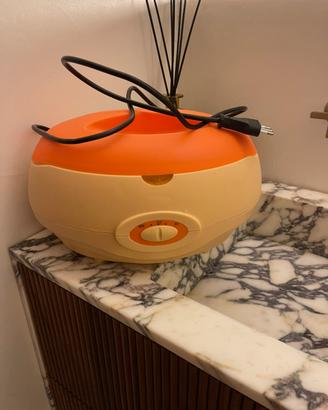 Macchina riscaldatore di cera