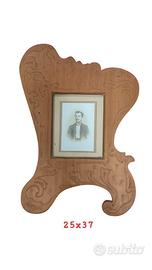 Antica cornice in legno intagliato con fotografia 