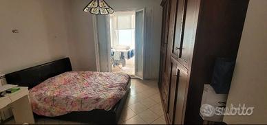 NUMIDIO QUADRATO BILOCALE ARREDATO Con TERRAZZO