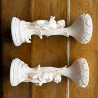 Coppia candelieri decorativi con putti