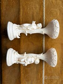 Coppia candelieri decorativi con putti