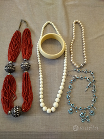 4 collane, bracciale e cristallo