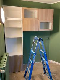 Struttura besta ikea con libreria + scaffali alto