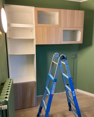Struttura besta ikea con libreria + scaffali alto