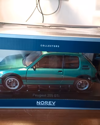 Peugeot 205gti 1/18  Norev sigillata 