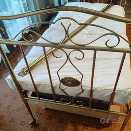 antico lettino in ottone