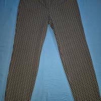 Pantaloni blu con disegno bolle bianche