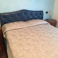 Letto matrimoniale in pelle capitonnè