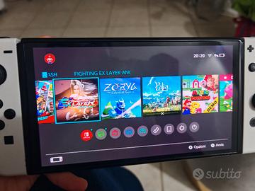 Nintendo Switch OLED White + 2 Giochi 