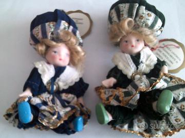 8 bamboline in porcellana