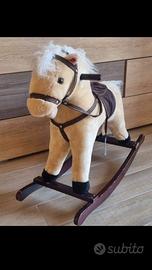 cavallo a dondolo con suoni