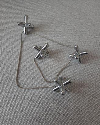 Sottopentola "Tripod" Alessi – Design Gabriele