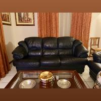 Coppia di divani in pelle nera – 3 posti + 2