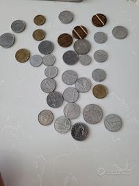 Vecchie lire, monete e miniassegni e valute