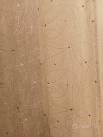 Tenda fatta su misura con passanti pois