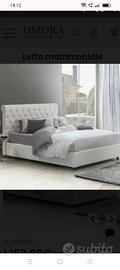Letto matrimoniale con reti elettriche