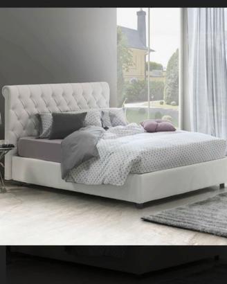 Letto matrimoniale con reti elettriche