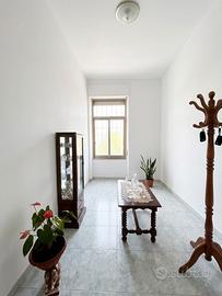 Quadrilocale con cortile privato