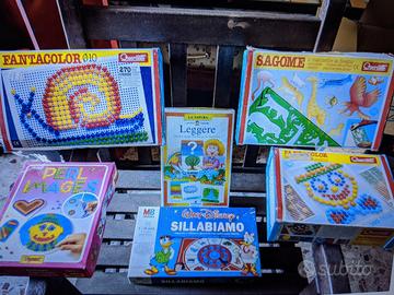 Giochi x piccini con chiodini colorati Quercetti