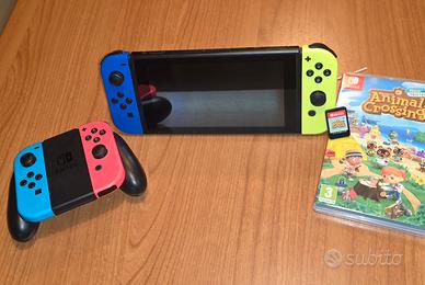 nintendo switch con 4 joy con e animal crossing