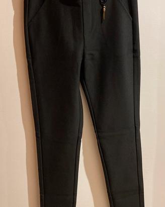 Pantaloni donna stretch con ciondolo
