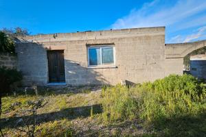 Fabbricato con terreno