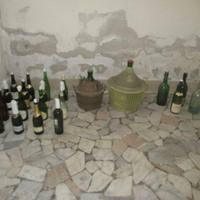 Nr. 2 damigiane e 20 bottiglie (tot. E 10)