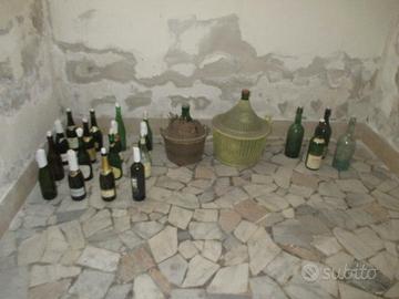 Nr. 2 damigiane e 20 bottiglie (tot. E 10)