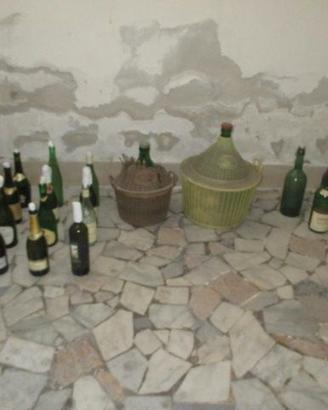 Nr. 2 damigiane e 20 bottiglie (tot. E 10)