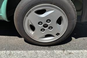 4 cerchi in lega con gomme + 4 gomme