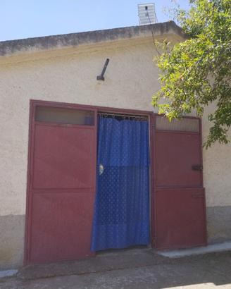 Terreno uliveto seminativo con casa