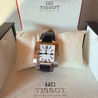 Tissot con scatola e libri