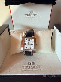 Tissot con scatola e libri