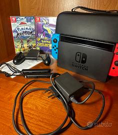 Console Nintendo Switch + Vari Accessori, 2 Giochi