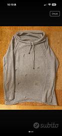 Maglione con buchi