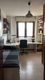 Camera con bagno privato in appartamento condiviso