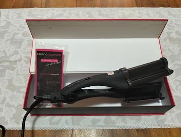 Piastra mossi capelli