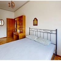 Letto matrimoniale in ferro battuto e rete