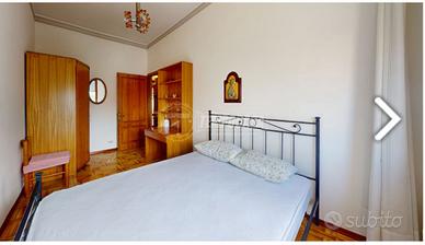 Letto matrimoniale in ferro battuto e rete