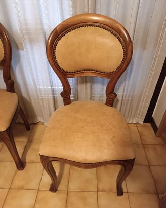 due sedie imbottite in pelle 