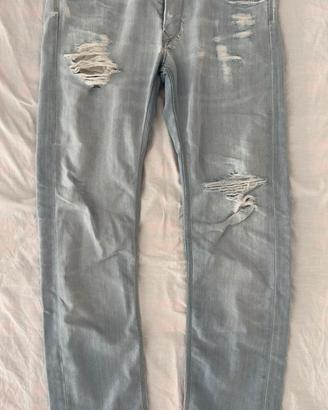 Jeans Lee azzurri con strappi taglia L Uomo