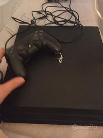 Ps4 con joypad e due giochi