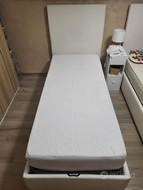 2 letti singoli con materassi