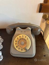 Telefono vintage a disco grigio e oro – Siemens