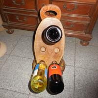 Porta bottiglie di vino ricavato da un tronco