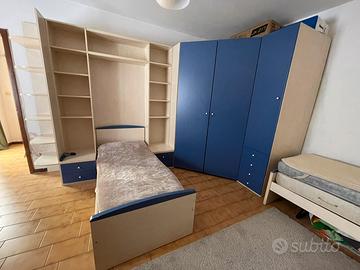 Camera completa 2 letti singoli e cabina armadio