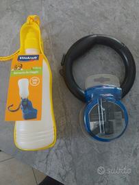 Guinzaglio estensibile e borraccia da viaggio. 