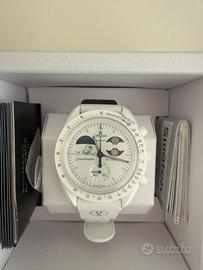 Omega Swatch Mission to Earthphase Moonshine gold