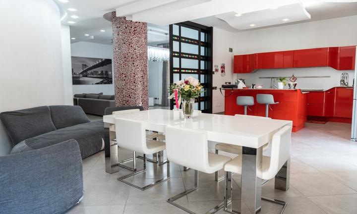 Appartamento con Terrazzo, Giardino e Posto Auto