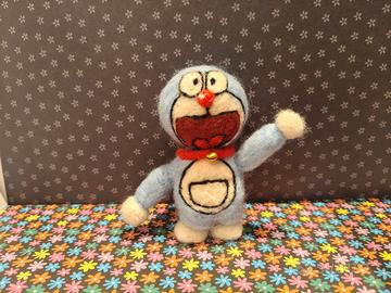 gioco in lana cardata